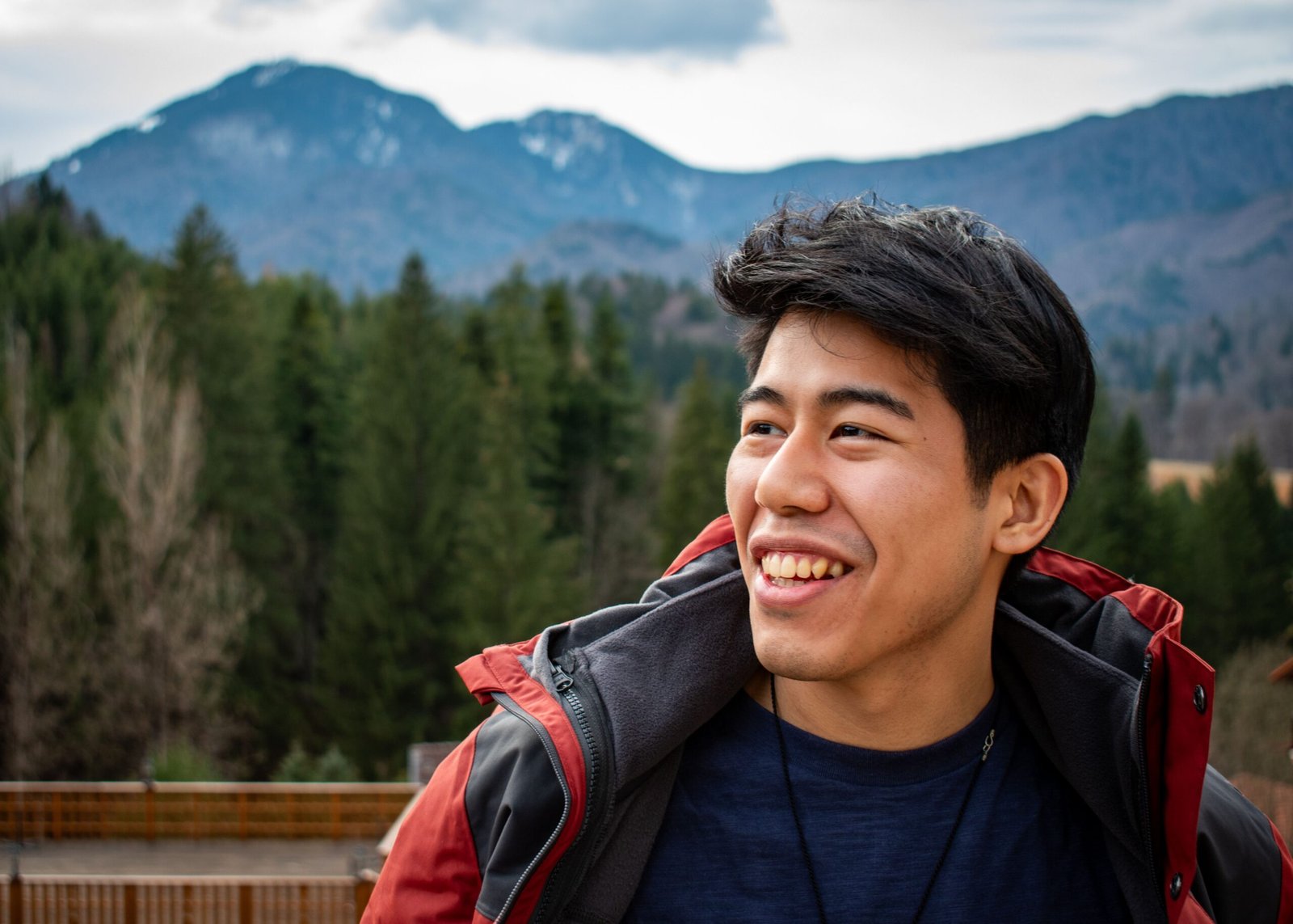 Smiling front-facing hiker representing vitality and cellular energy